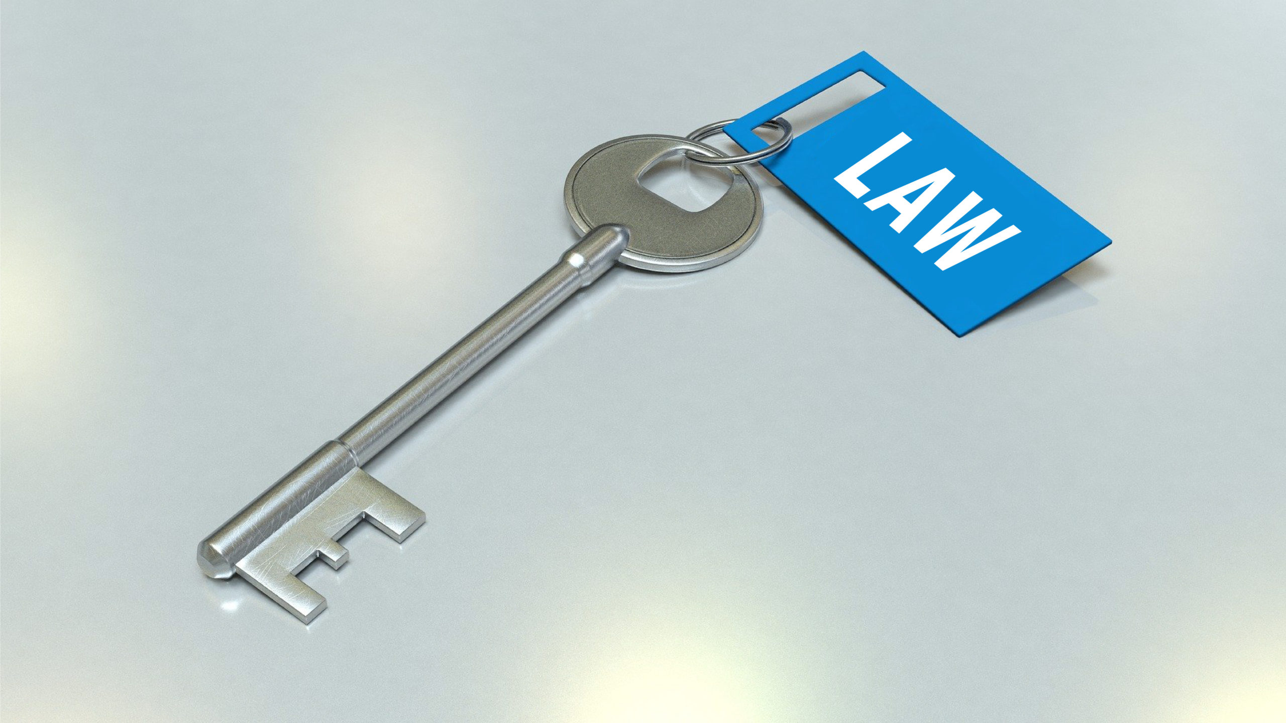 Image of a key with the word law on the tag